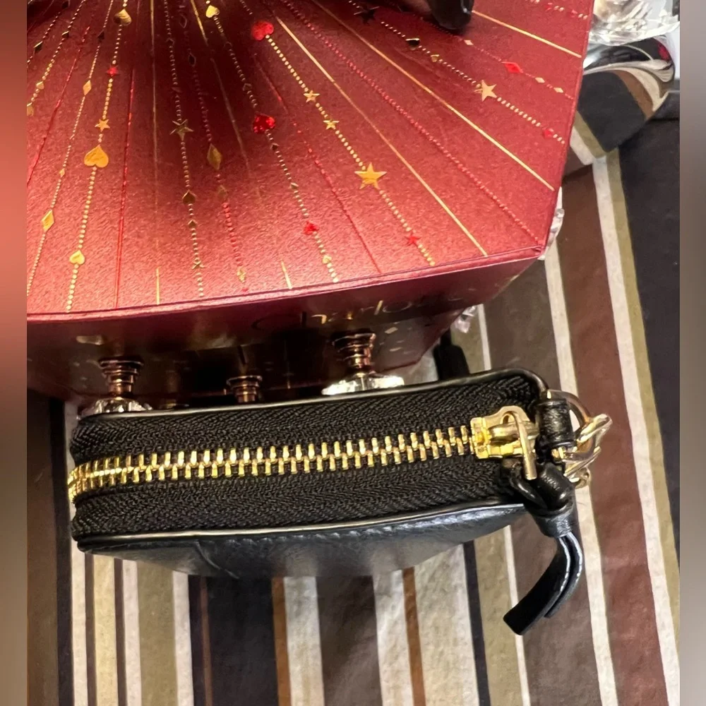 Tory Burch Black Wristlet with Gold Accents